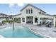 Relaxing pool area with a covered pavilion and play area at 3560 Maple Bay Ln, Land O Lakes, FL 34638