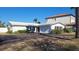 Ranch style home with attached garage at 10350 Paradise Blvd, Treasure Island, FL 33706