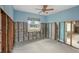 Blue walls and exposed framing in a bedroom under renovation at 14011 E Parsley Dr, Madeira Beach, FL 33708