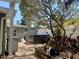 Image of backyard featuring hot tub, storage shed, and brick paving at 1943 Bayou Grande Ne Blvd, St Petersburg, FL 33703