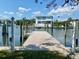 A well-maintained dock provides direct access to the waterfront, enhancing the property's appeal for boaters at 1943 Bayou Grande Ne Blvd, St Petersburg, FL 33703