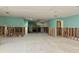 Spacious interior showing construction materials, offering potential for customization and renovation at 1943 Bayou Grande Ne Blvd, St Petersburg, FL 33703