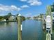 Wide canal waterway with docks and boats and tropical vegetation at 1943 Bayou Grande Ne Blvd, St Petersburg, FL 33703