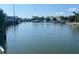 Idyllic waterfront view with boats docked, showcasing a peaceful and serene canal setting at 1943 Bayou Grande Ne Blvd, St Petersburg, FL 33703