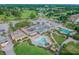 Aerial view of clubhouse, pools and parking lot at 3942 Trophy Blvd, New Port Richey, FL 34655