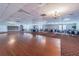 Large banquet hall with hardwood dance floor at 3942 Trophy Blvd, New Port Richey, FL 34655