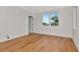 Bedroom features a window, crown molding and wood floors at 407 S Albany Ave # 2, Tampa, FL 33606
