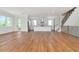 Spacious living room with hardwood floors, recessed lighting, open layout, and combined kitchen space at 407 S Albany Ave # 2, Tampa, FL 33606