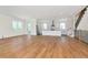 Open-concept living space featuring wood floors, a modern kitchen, and lots of natural light at 407 S Albany Ave # 2, Tampa, FL 33606