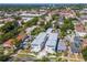 A high-angle view of the property surrounded by a residential neighborhood with mature trees at 407 S Albany Ave # 6, Tampa, FL 33606