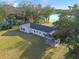 Ranch house with lake view and large backyard at 16122 E Lake Burrell Dr, Lutz, FL 33549