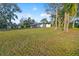 Modern farmhouse with large backyard and lake access at 16122 E Lake Burrell Dr, Lutz, FL 33549