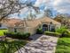 Single-Gathering home with garage and landscaped yard at 5195 Highbury Cir, Sarasota, FL 34238