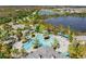 Community pool with lounge area at 26810 Weiskopf Dr, Englewood, FL 34223