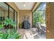 Lanai with grill and outdoor furniture at 26810 Weiskopf Dr, Englewood, FL 34223