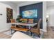 Charming dining area with a wooden table and wicker chairs at 26810 Weiskopf Dr, Englewood, FL 34223