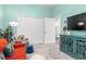 Bright office with colorful accents and built-in storage at 26810 Weiskopf Dr, Englewood, FL 34223