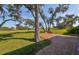 Brick patio overlooking a lush green golf course at 1148 Emerald Hill Way, Valrico, FL 33594