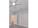 Bright bedroom with ceiling fan and spacious closet at 1148 Emerald Hill Way, Valrico, FL 33594