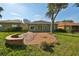 Brick paver patio and grassy backyard at 1148 Emerald Hill Way, Valrico, FL 33594