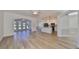 Open concept living room, kitchen, and view to backyard at 1148 Emerald Hill Way, Valrico, FL 33594