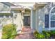Home's exterior entrance with walkway at 1148 Emerald Hill Way, Valrico, FL 33594
