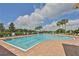 Resort-style swimming pool with lounge chairs at 1148 Emerald Hill Way, Valrico, FL 33594