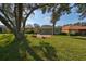 Spacious backyard with patio and lush landscaping at 1148 Emerald Hill Way, Valrico, FL 33594