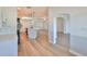 Modern kitchen with white cabinets, stainless steel appliances, and an island at 1148 Emerald Hill Way, Valrico, FL 33594