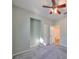 Bedroom with ceiling fan and additional closet space at 1148 Emerald Hill Way, Valrico, FL 33594