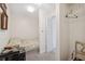 Small bedroom with closet and adjacent bathroom at 3942 Trophy Blvd, New Port Richey, FL 34655