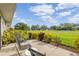 Private patio overlooking the lush green at 3942 Trophy Blvd, New Port Richey, FL 34655