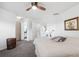 Main bedroom with ceiling fan and en-suite bathroom at 3942 Trophy Blvd, New Port Richey, FL 34655