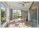 Relaxing sunroom with outdoor view and seating area at 3942 Trophy Blvd, New Port Richey, FL 34655
