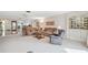 Living room with built-in bar and seating area at 3942 Trophy Blvd, New Port Richey, FL 34655