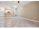 Living room with tile floors and access to kitchen at 4323 Bayside Village Dr # 105, Tampa, FL 33615