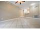 Bright living room with tile flooring and neutral walls at 4323 Bayside Village Dr # 105, Tampa, FL 33615