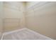 Large walk-in closet with wire shelving at 4323 Bayside Village Dr # 105, Tampa, FL 33615