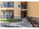 Well-maintained building entrance with stairs and walkway at 4323 Bayside Village Dr # 105, Tampa, FL 33615