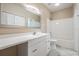 Bathroom with white vanity, bathtub and tile flooring at 4323 Bayside Village Dr # 105, Tampa, FL 33615