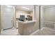 Modern kitchen with white cabinets, stainless steel appliances, and tile backsplash at 4323 Bayside Village Dr # 105, Tampa, FL 33615