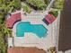Inviting community pool with ample lounge chairs and shade structures at 4323 Bayside Village Dr # 105, Tampa, FL 33615