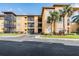 Apartment building with ample parking and lush landscaping at 4323 Bayside Village Dr # 105, Tampa, FL 33615