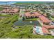 Community overview featuring resort-style amenities and tranquil waterfront at 4323 Bayside Village Dr # 105, Tampa, FL 33615