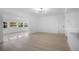 Bright and spacious living room with light wood floors at 1009 Farragut N Dr, St Petersburg, FL 33710