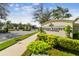 Entrance to Hidden Reserve features well-maintained landscaping, stone signage, and a gated entrance at 101 Brookover Ln, Brandon, FL 33511