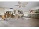 Living room under renovation, showing exposed framing and damaged walls at 1020 Palm Dr, Belleair Beach, FL 33786