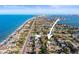 Aerial view of property near the beach, showing its location and surrounding area at 1020 Palm Dr, Belleair Beach, FL 33786