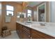 Spacious bathroom with double vanity and marble countertop at 20103 Shady Hill Ln, Tampa, FL 33647