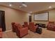 Recessed lighting and comfortable seating in home theater at 20103 Shady Hill Ln, Tampa, FL 33647